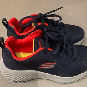 Skechers sneakers, navy blue and red details. Never worn. Size 13. Memory foam.